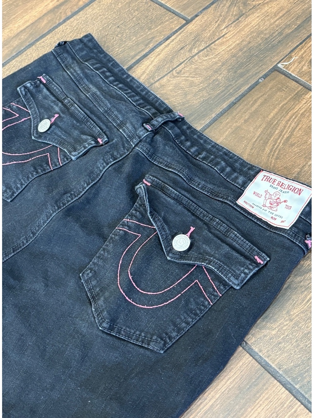 True religion black denim jeans with pink stitching
